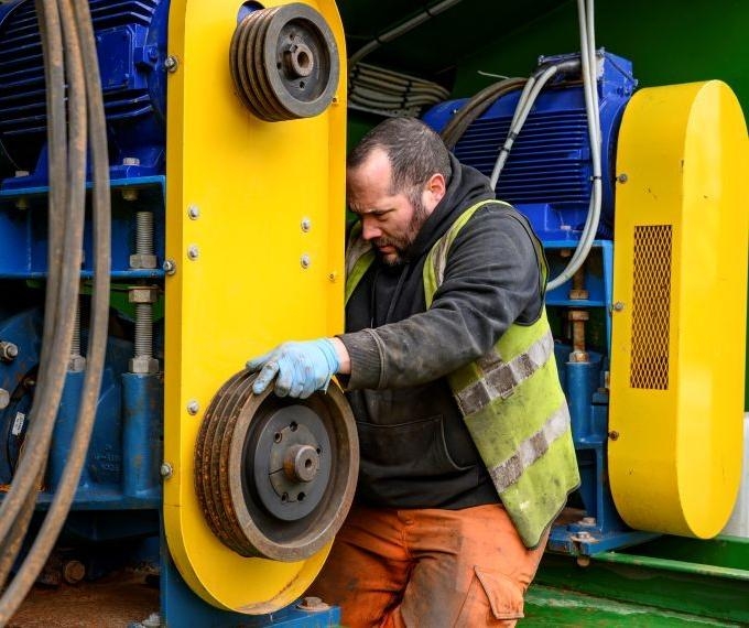 PSD employees working on equipment